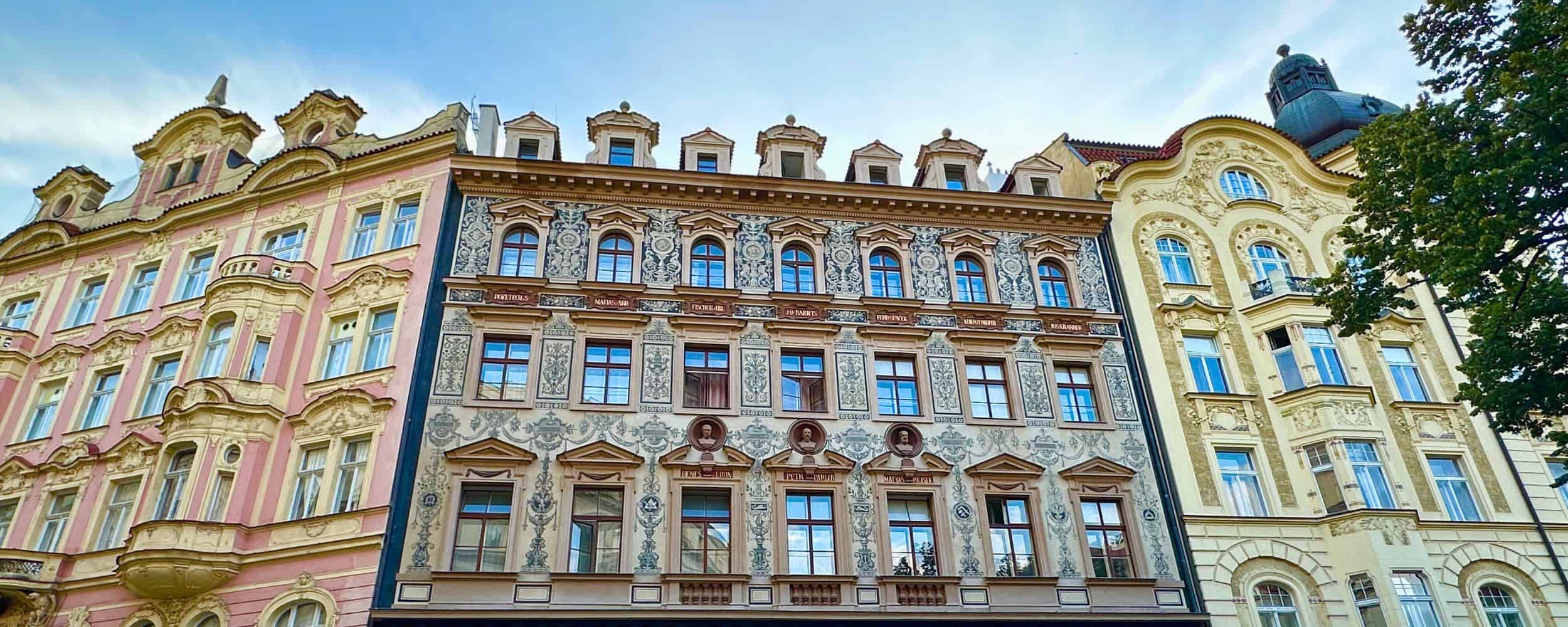 Ornate architecture in Prague Colorful Art Nouveau façades in Prague with ornate detailing and decorative gables