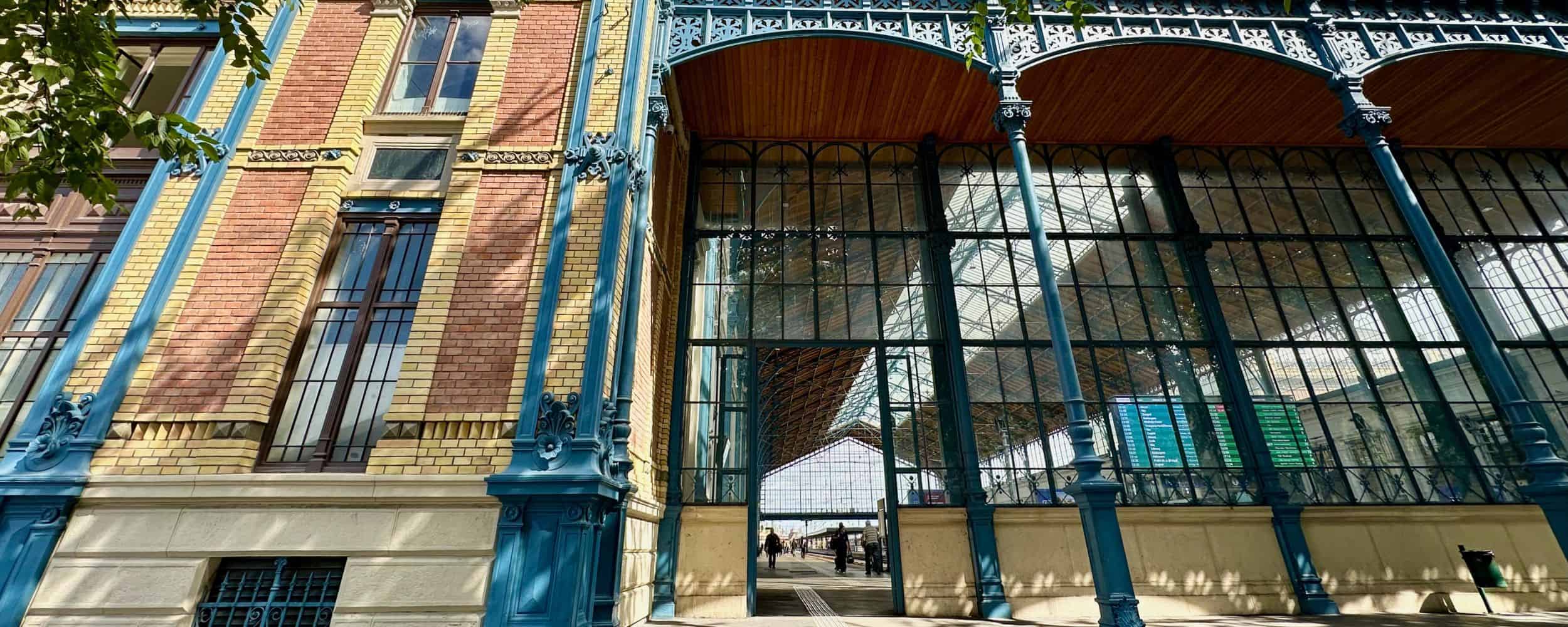 Nyugati Railway Station in Budapest Exterior of Nyugati Railway Station in Budapest showing the iron-and-glass façade and arched entrance