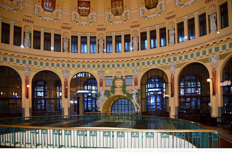 Art Nouveau interior of Fantova Hall at Prague Main Railway Station with arched galleries and sculptural details
