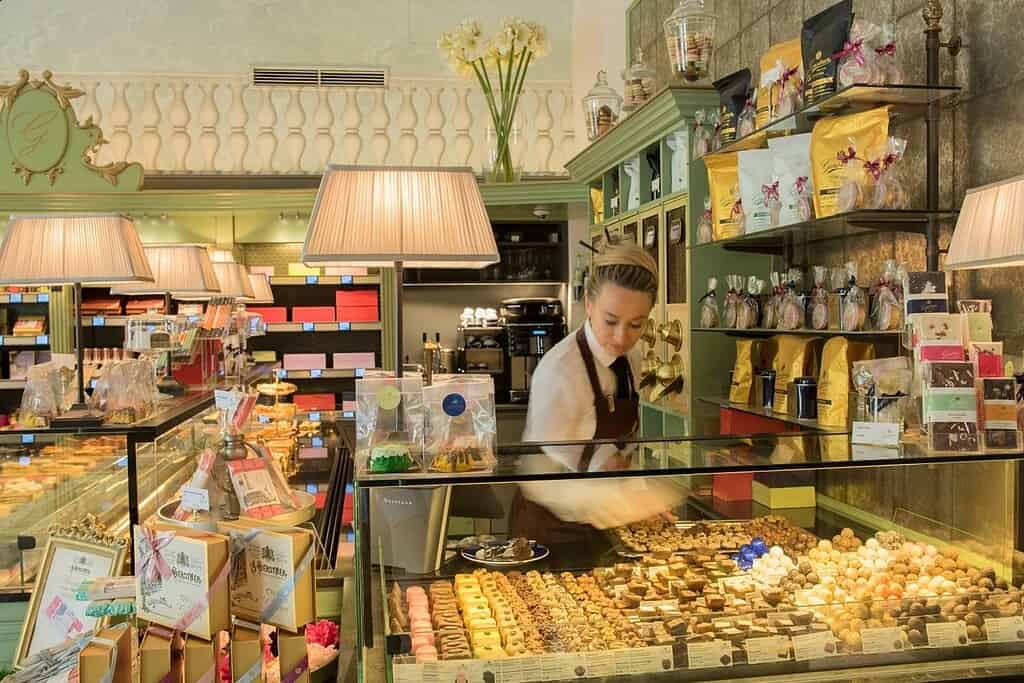 Interior of Gerstner confectionery in Vienna with Easter chocolates and pralines displayed in glass cases