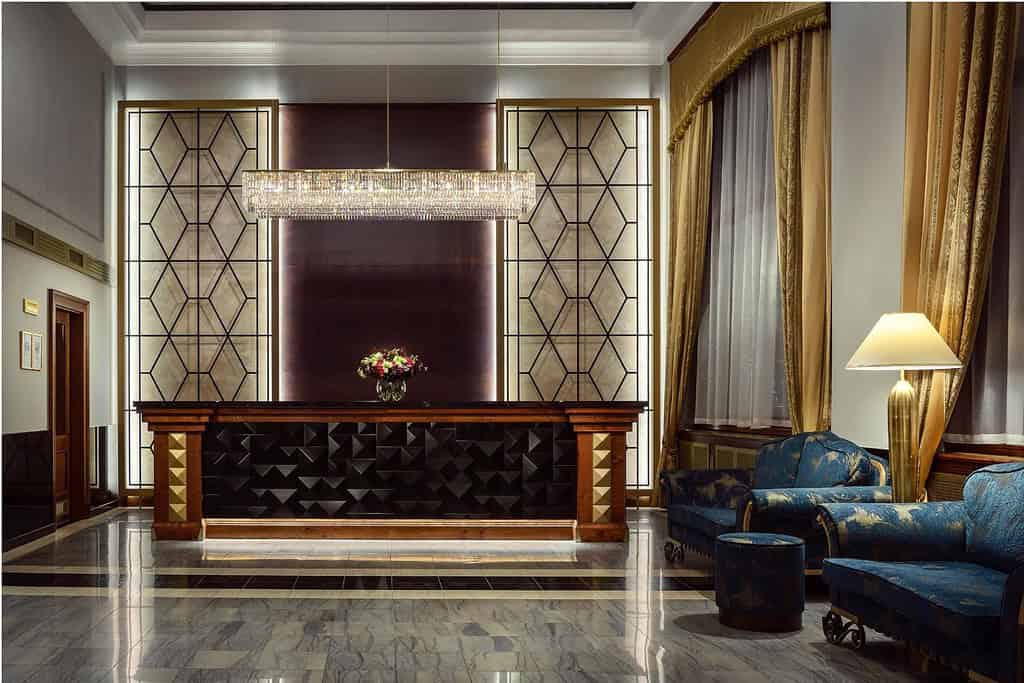 Hotel Imperial Prague carousel featuring the Art Deco reception area, a guest room, and a richly detailed lobby seating nook in central Prague