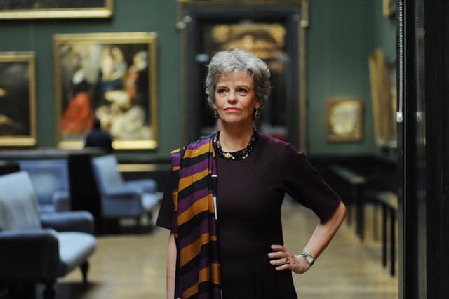 Dr. Sabine Haag, former Director General of the Kunsthistorisches Museum in Vienna in one of the museum's art galleries with paintings in gilded frames in the background