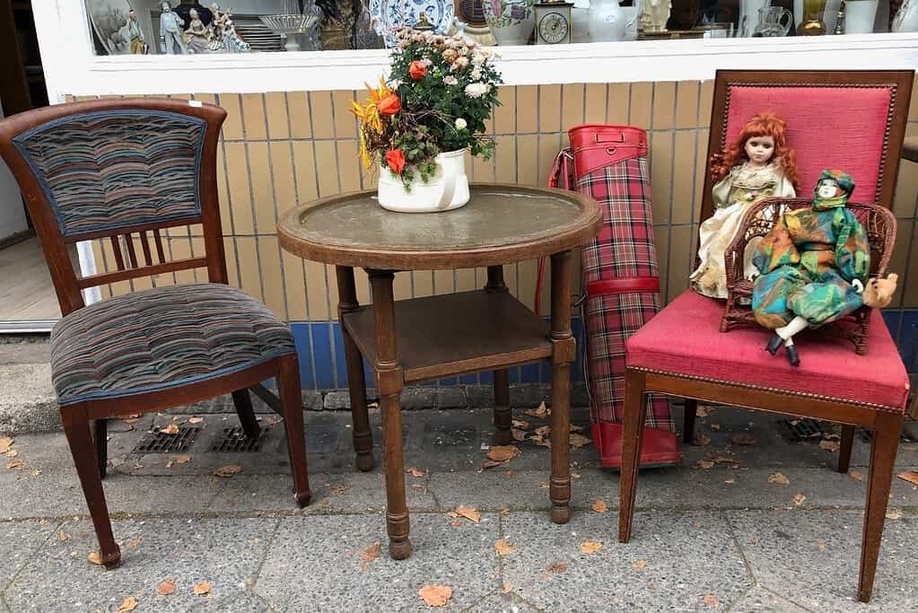 Antique dolls, chairs, and table at an shop in Charlottenburg in Berlin, Germany
