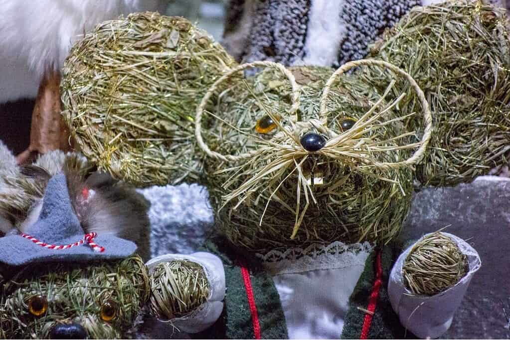 Straw mouse with whiskers and spectacles at a traditional Christmas market in Vienna, Austria